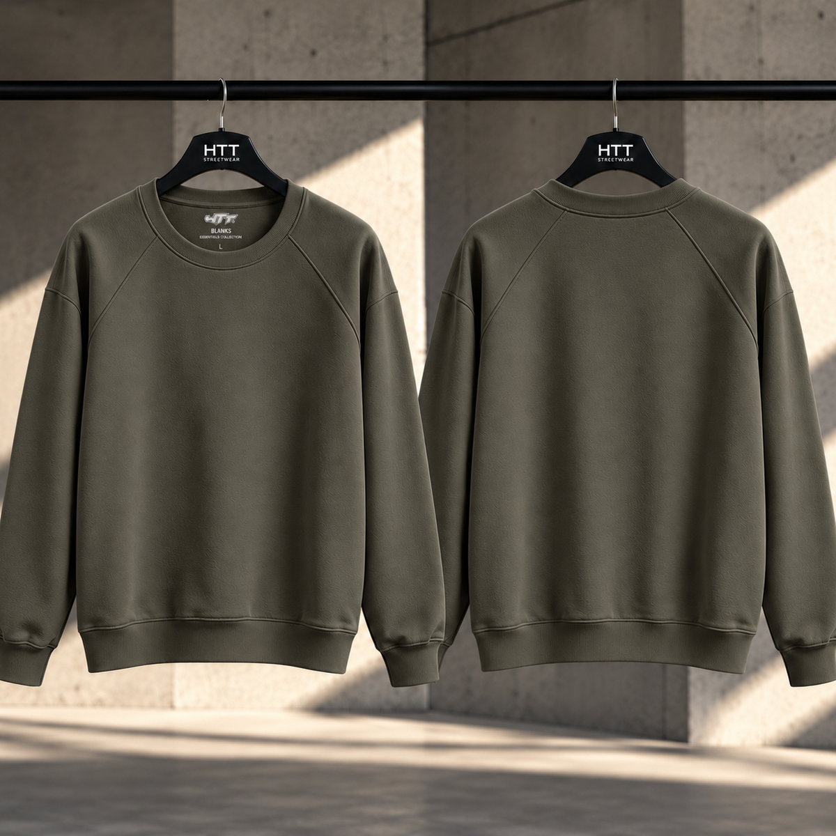 HTT BLANKS Charcoal Grey sweatshirt voor- en achterkant aan kledinghangers