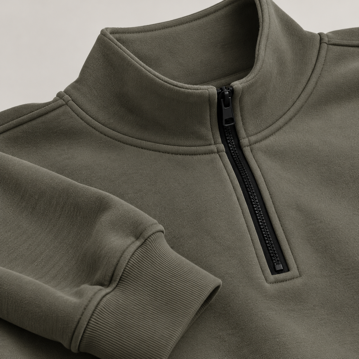 HTT BLANKS charcoal grey half zip sweatshirt close-up of collar, black zipper and ribbed cuff