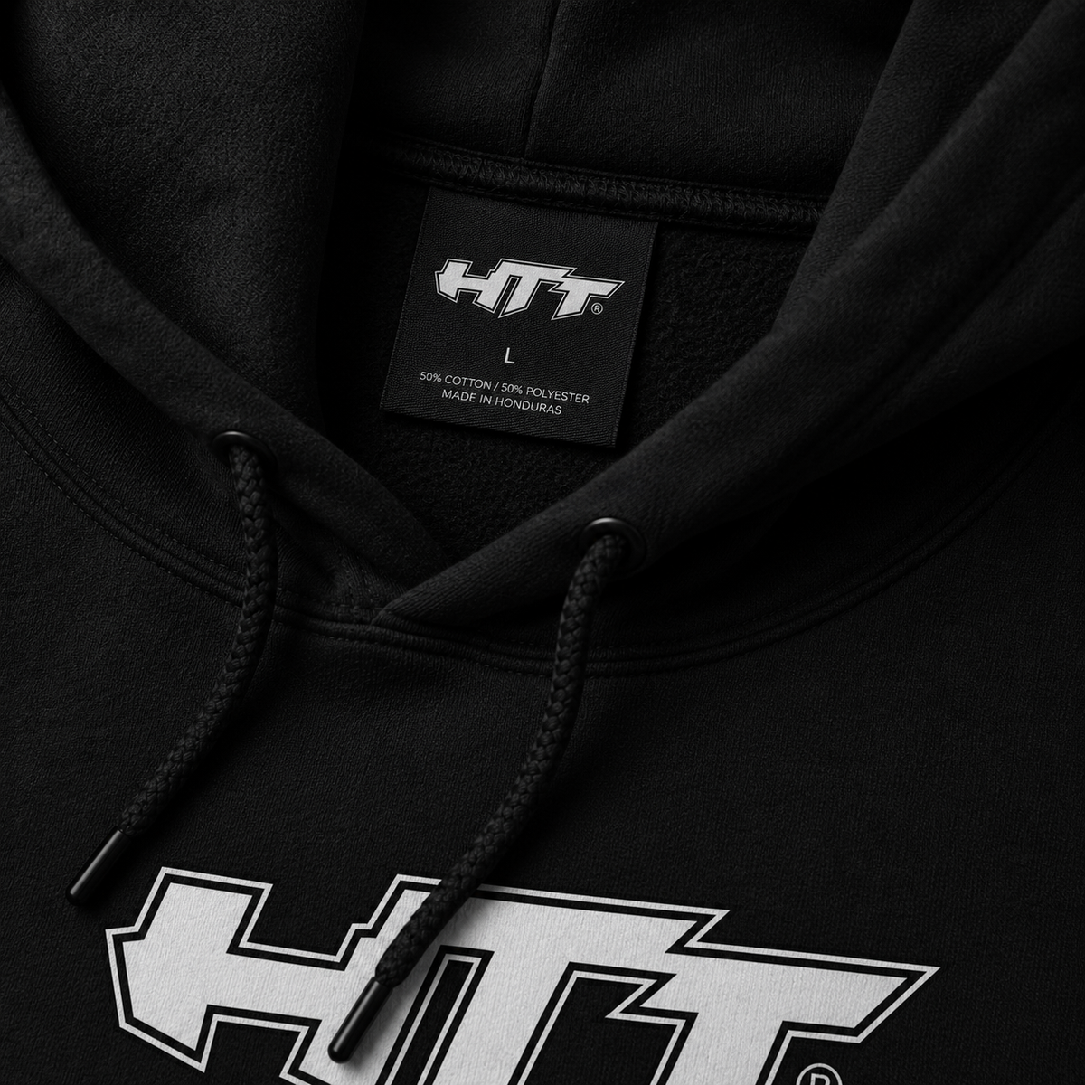 HTT Bold Hoodie detail shot with HTT neck label and premium fabric