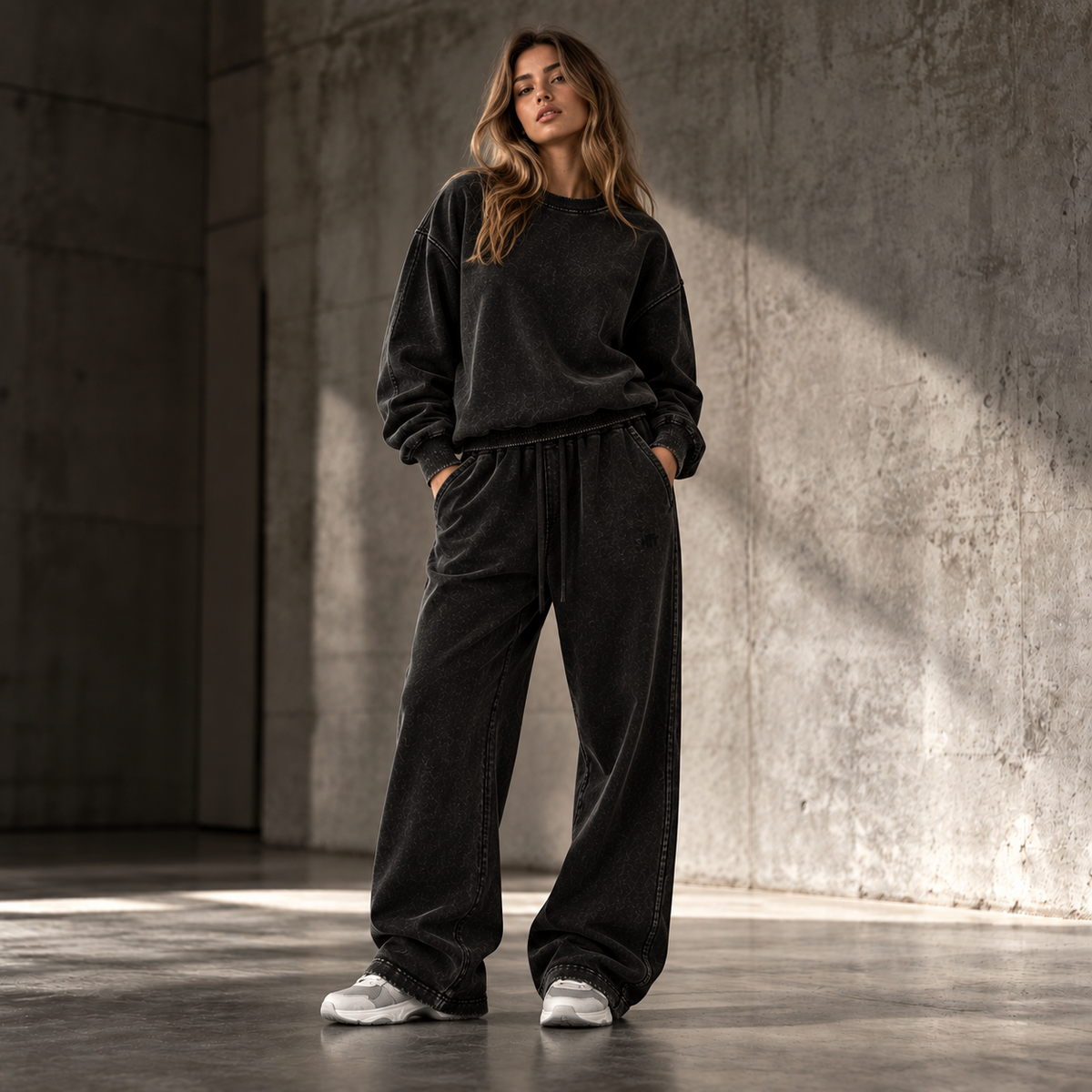 HTT Streetwear Faded Black heavyweight set on female model front view – oversized sweater and relaxed sweatpants