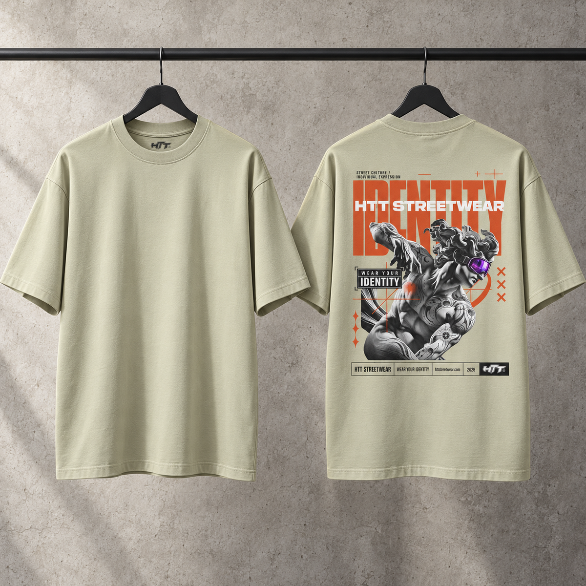 HTT Identity Sculpt T-shirt in Pastel Gray on hangers, showing the plain front and orange graphic back print.