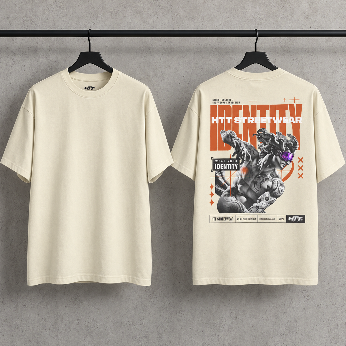 HTT Identity Sculpt T-shirt in White Rock cream on hangers, showing the plain front and graphic back print.
