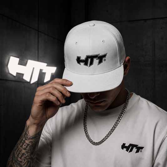HTT Signature Snapback white worn by male model with embroidered HTT front logo